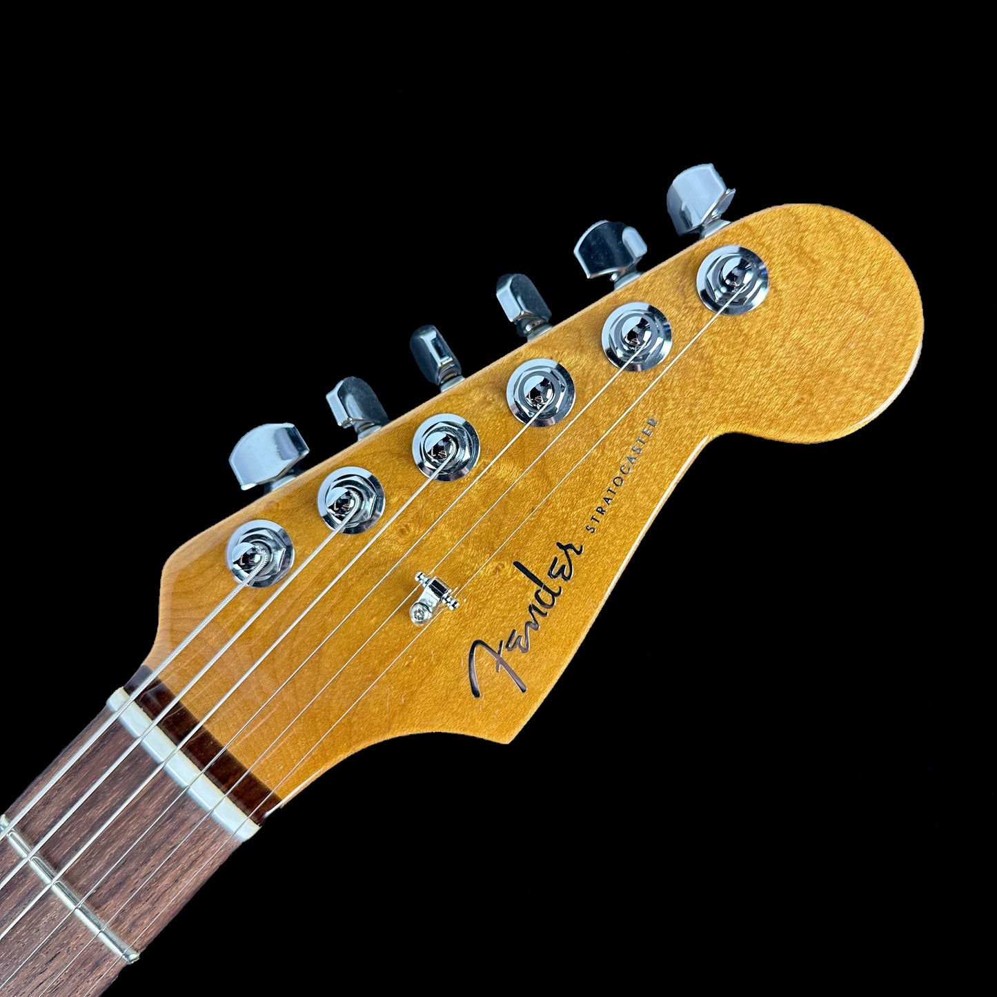 Headstock of Fender Custom Shop American Custom Strat NOS RW Amber Natural.