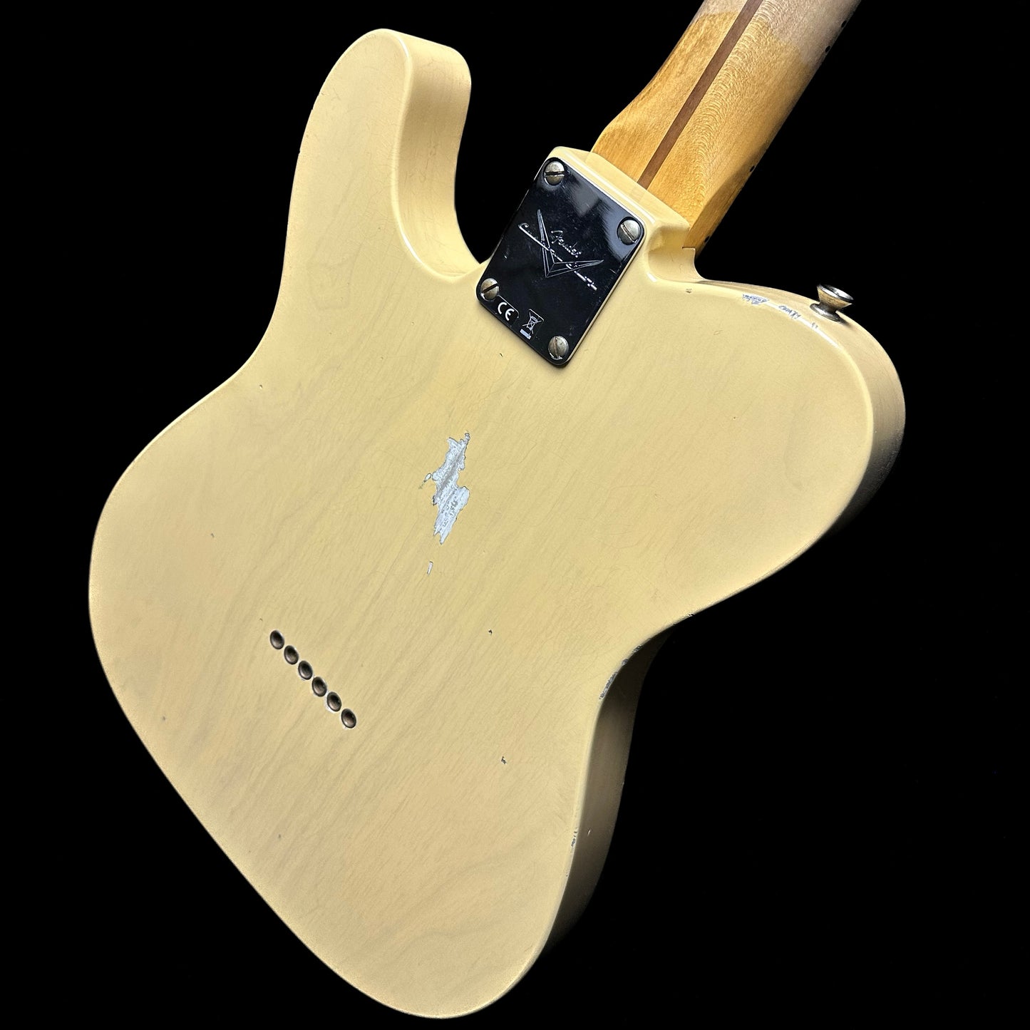 Back angle of Fender Custom Shop 1952 Telecaster Relic Aged Nocaster Blonde.