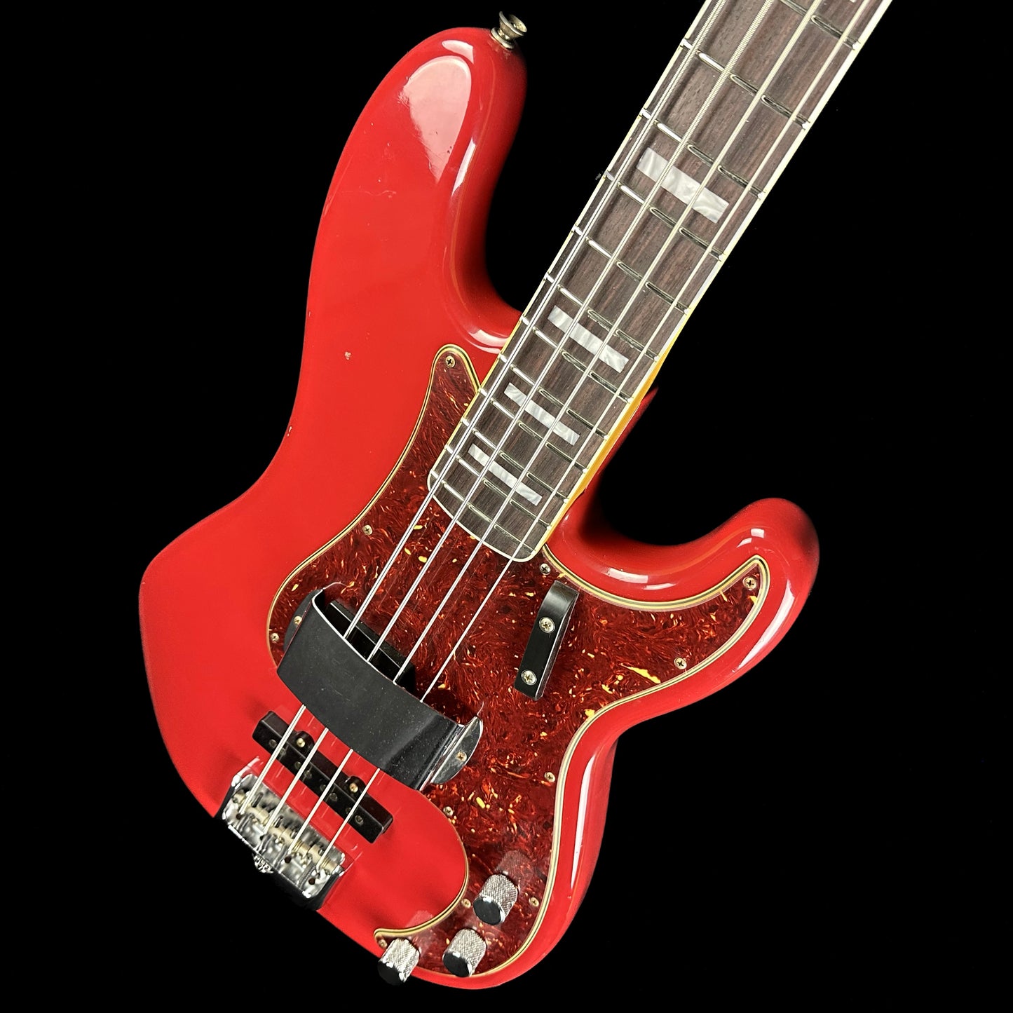 Front angle of Fender Custom Shop Limited Edition P Bass Special Journeyman Relic Aged Dakota Red.