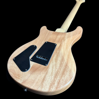 Back angle of PRS Paul Reed Smith SE Custom 22 Semi-Hollow Santana Yellow.