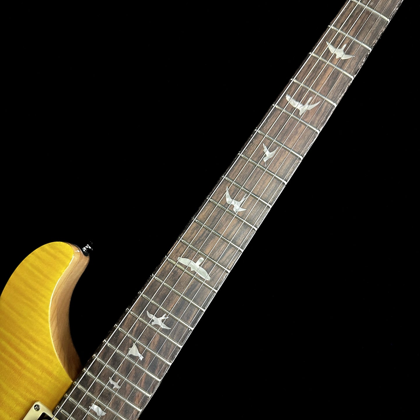 Close up of PRS Paul Reed Smith SE Custom 22 Semi-Hollow Santana Yellow fretboard.