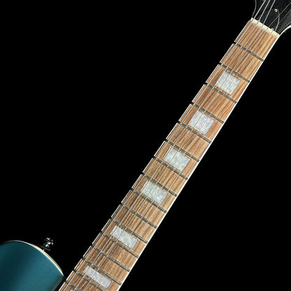 Close up angle of Reverend Roundhouse Deep Sea Blue fretboard.