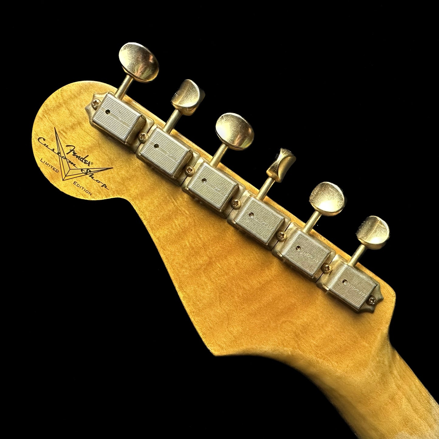 Back of Fender Custom Shop Limited Edition '55 "bone-tone" Strat - Relic Wide-Fade 2-color Sunburst headstock.