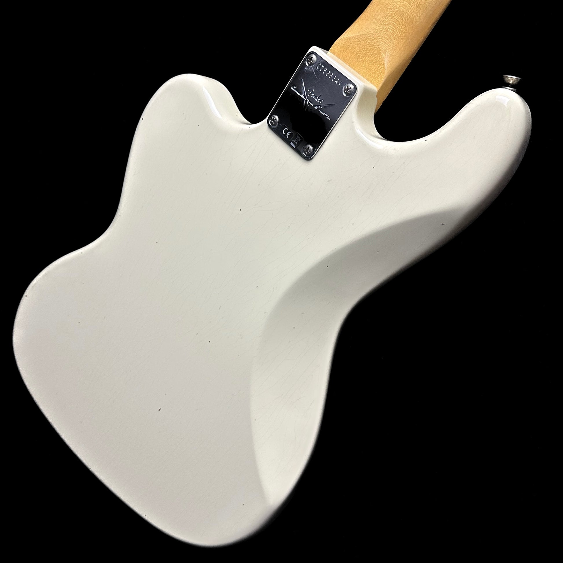 Right angle of Fender Custom Shop Bass VI Journeyman Relic Vintage White back.