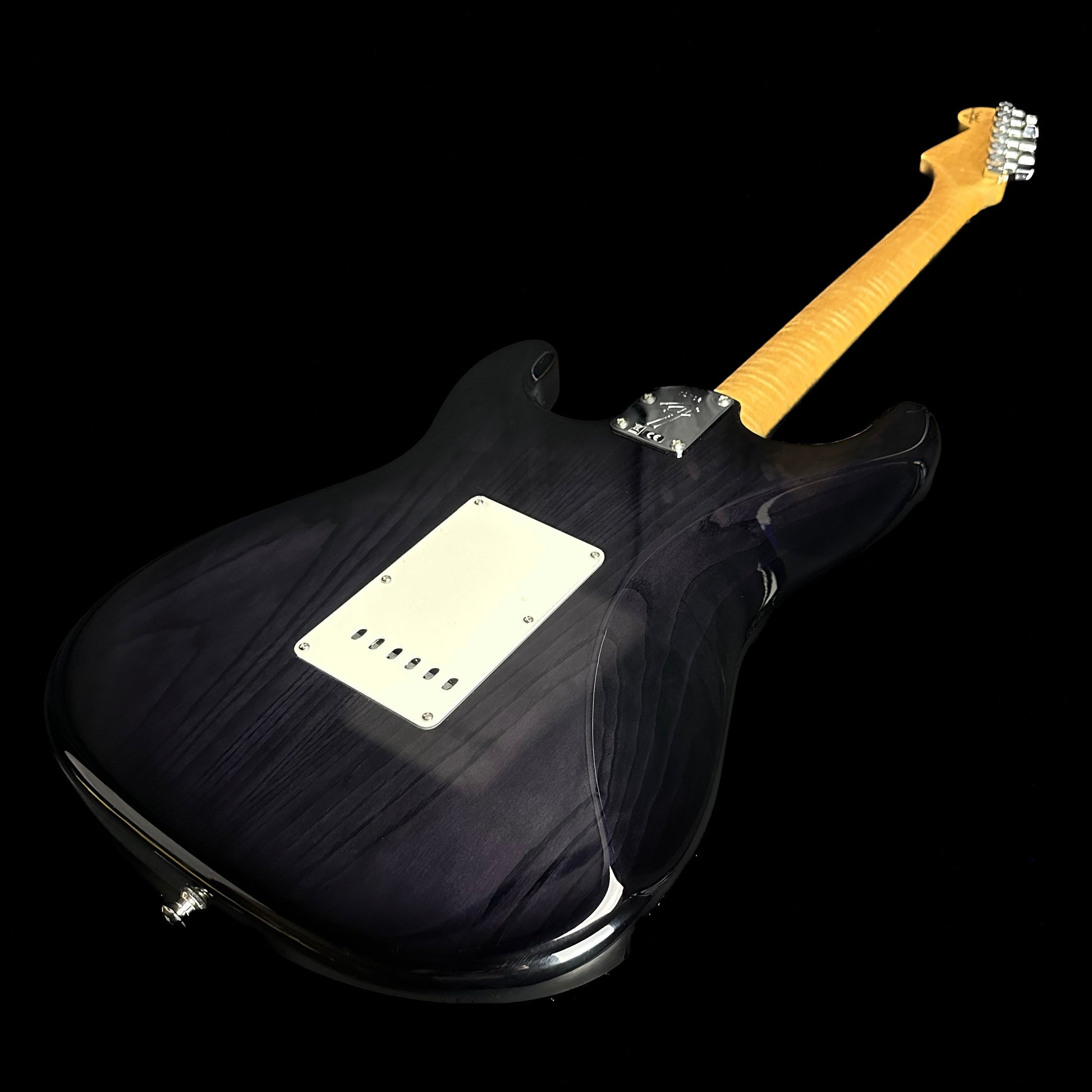 Bottom right angle of Fender Custom Shop American Custom Stratocaster RW Ebony Transparent back.