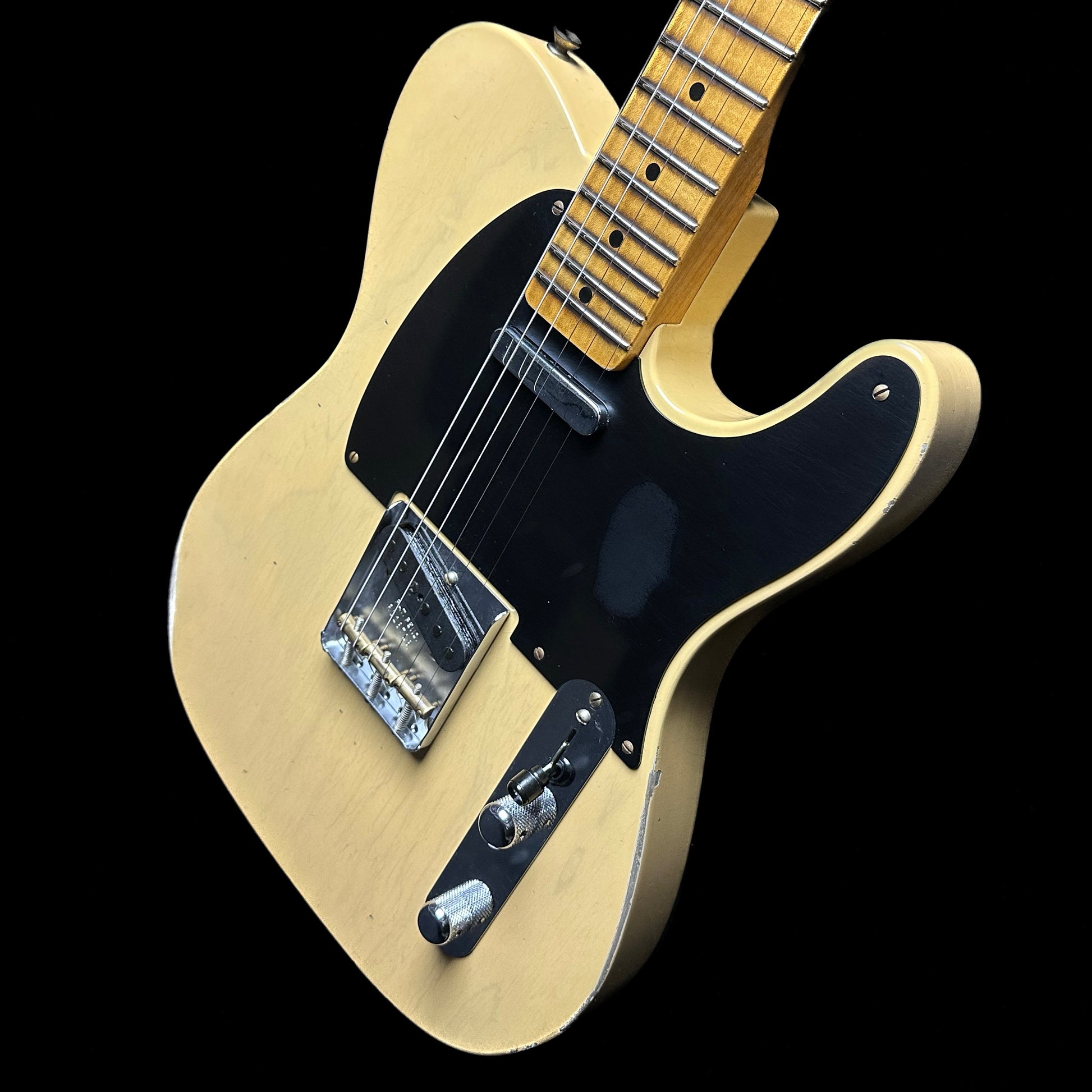 Front angle of Fender Custom Shop 1952 Telecaster Relic Aged Nocaster Blonde.
