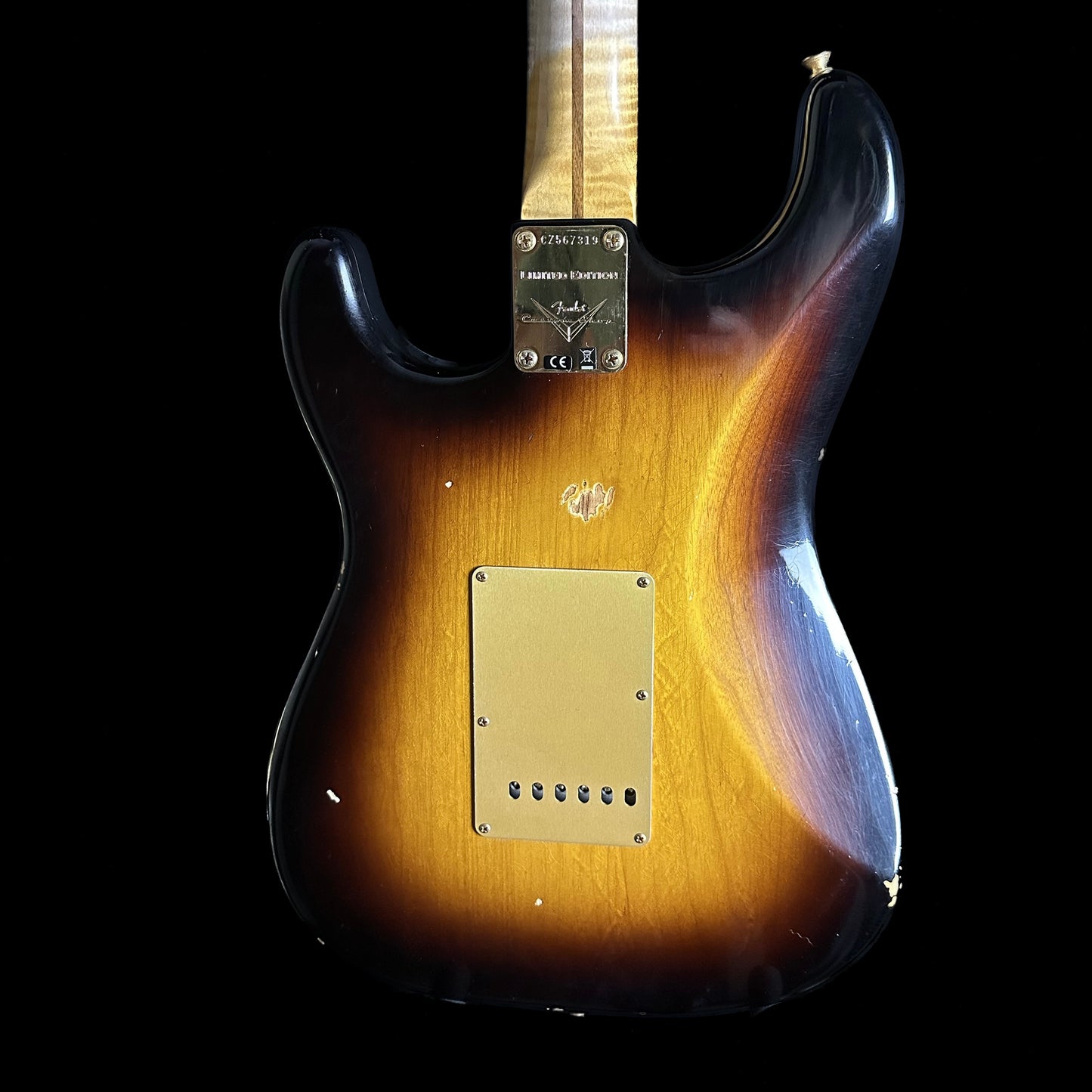 Back of Fender Custom Shop Limited Edition '55 "bone-tone" Strat - Relic Wide-Fade 2-color Sunburst.