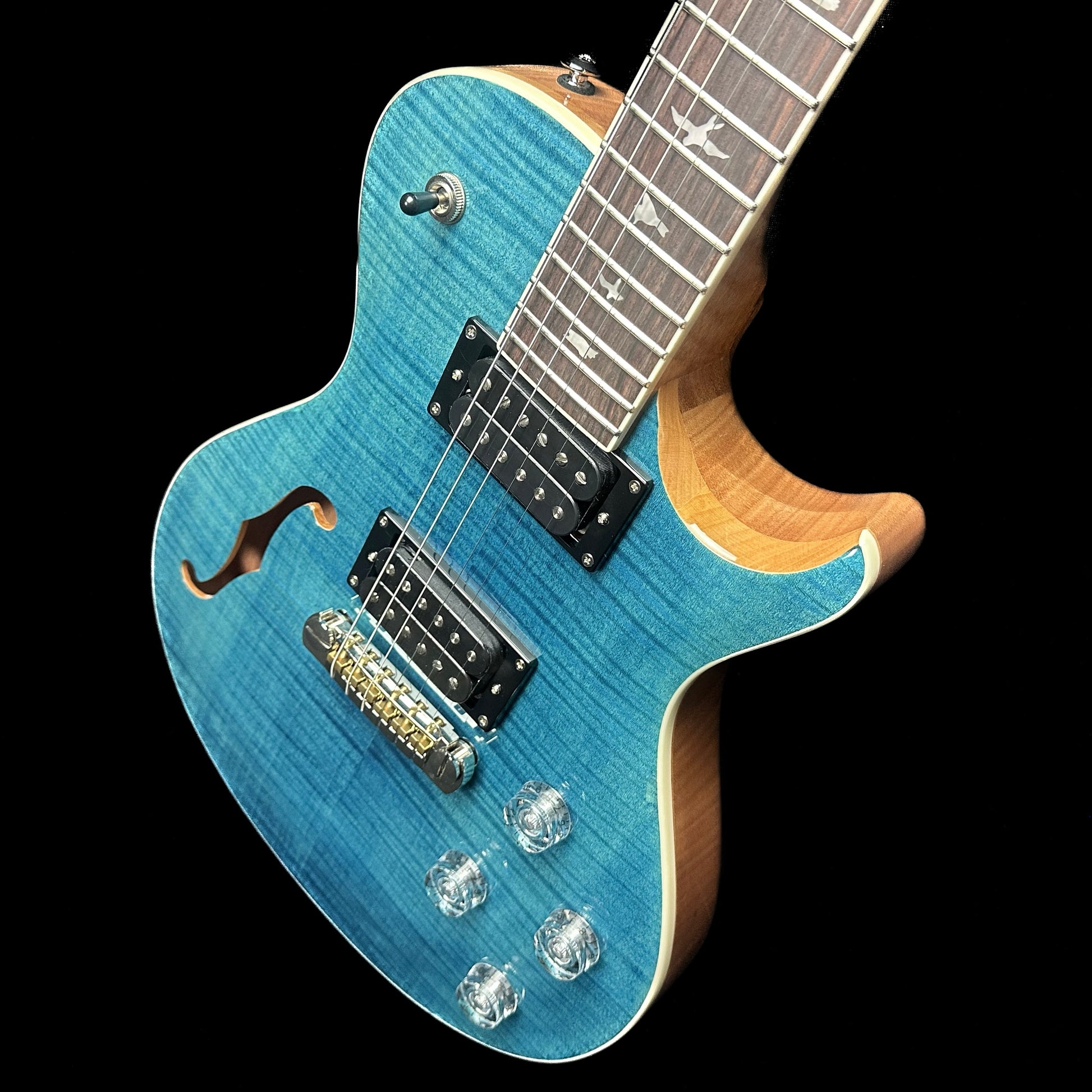 Top right angle of PRS Paul Reed Smith SE Zach Myers 594 Semi-Hollow Myers Blue body.