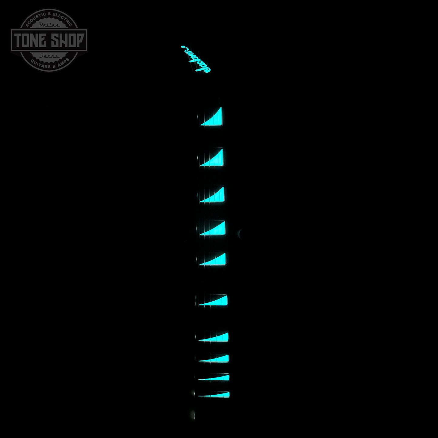Glowing inlays on fretboard of Jackson Custom Shop TSG Illuminati SL2H FR  Kawasabi Green.