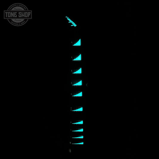 Glowing inlays on fretboard of Jackson Custom Shop TSG Illuminati SL2H FR  Kawasabi Green.