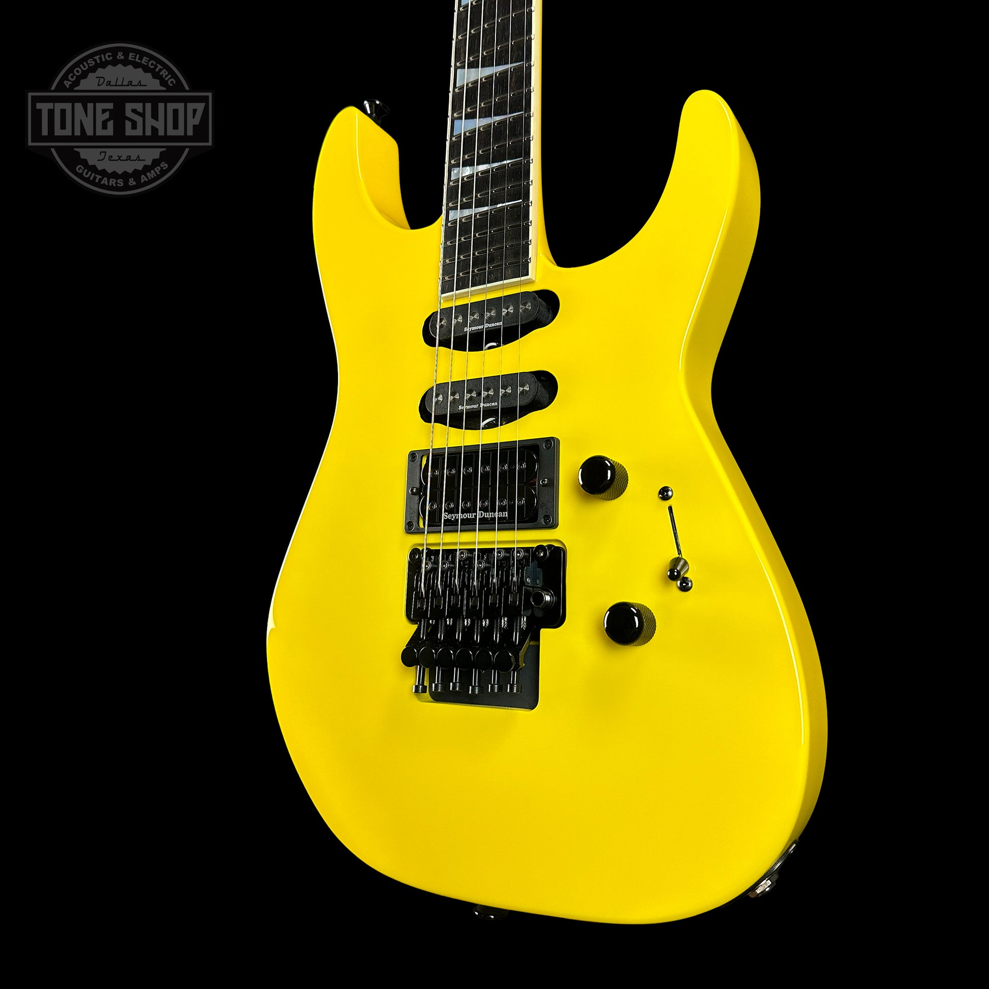 Front angle of Jackson Custom Shop SL HSS Floyd Rose Graf Yellow.