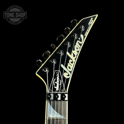 Front of headstock of Jackson Custom Shop SL HSS Floyd Rose Graf Yellow.