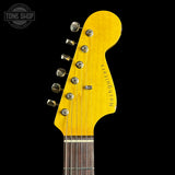 Front of headstock of Nash JM-63 Black over 3-Tone Medium Aging.