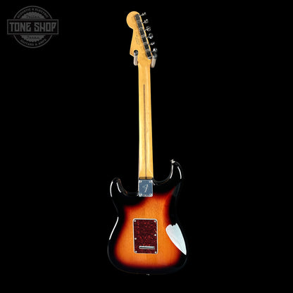 Electric guitar with a sunburst finish on a black background, featuring the Tone Shop logo.