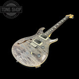 Front angle of PRS Paul Reed Smith CE24 Semi-Hollow Quilt Faded Gray Black.