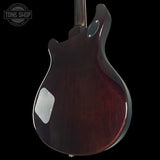 Back angle of PRS Wood Library McCarty 594 10-top Quilt Black Gold Wraparound Korina.