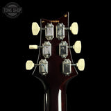 Back of headstock of PRS Wood Library McCarty 594 10-top Quilt Black Gold Wraparound Korina.