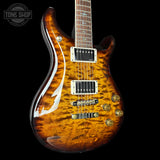 Front angle of PRS Wood Library McCarty 594 10-top Quilt Black Gold Wraparound Korina.