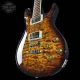 Front angle of PRS Wood Library McCarty 594 10-top Quilt Black Gold Wraparound Korina.