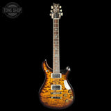 Full front of PRS Wood Library McCarty 594 10-top Quilt Black Gold Wraparound Korina.