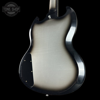 Guitar body with a brushed metal finish on a black background, featuring the Tone Shop logo.