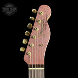 Front of headstock of Fender Custom Shop Limited Edition Cunife Tele Custom Journeyman Relic Aged Champagne Sparkle.