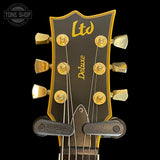 Headstock of Used 2011 ESP LTD Deluxe EC 1000 Matte Black.