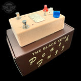 Side angle of Used 2025 Warm Audio The Black Keys Peach Fuzz Limited.