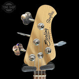 Headstock of Used Sterling by Music Man Sting Ray Bass Satin Black.