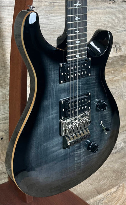 Front left angle of PRS Paul Reed Smith SE Custom 24 Floyd Charcoal Burst.