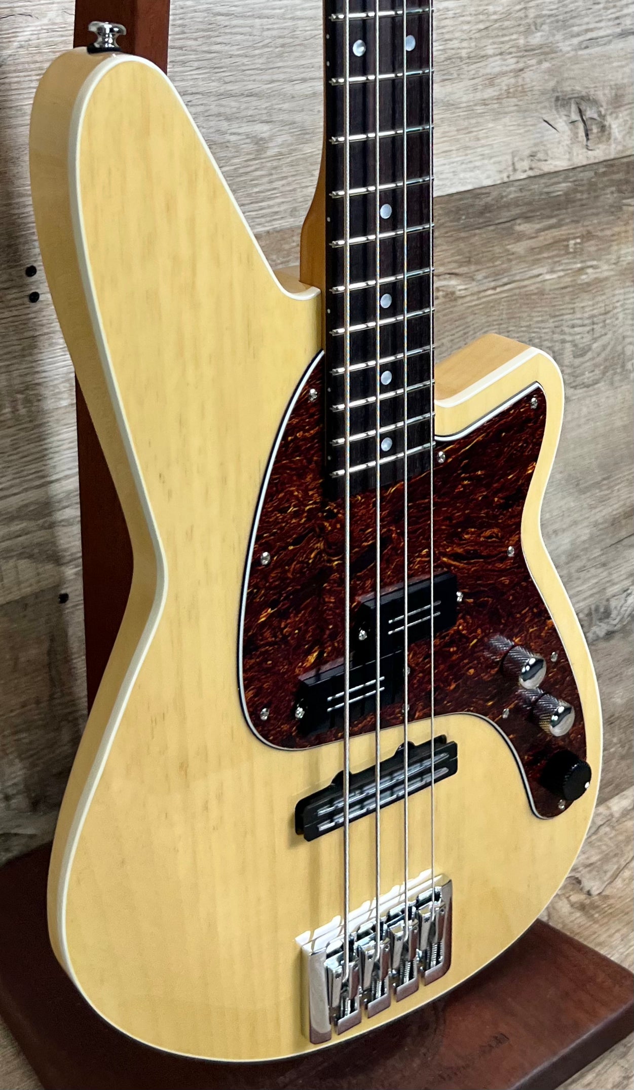 Front left angle of Reverend Decision P Bass Natural.