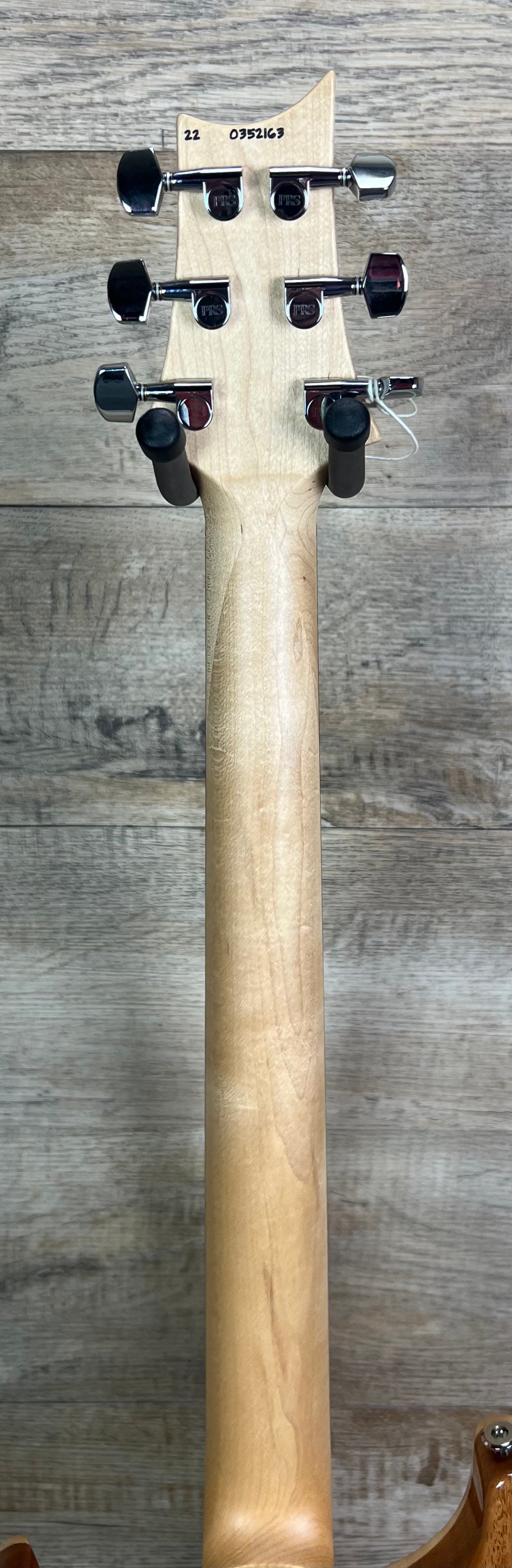 Back of neck of PRS Paul Reed Smith CE 24 Amber.