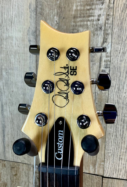 Close up of PRS Paul Reed Smith SE Custom 24 Bonnie Pink/Natural Back headstock.