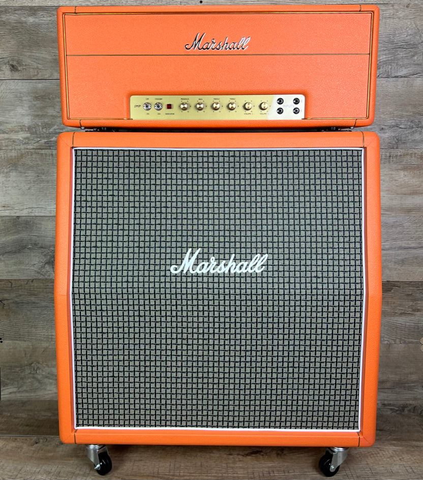 Front of Marshall Custom Shop  Tone Shop Exclusive Orange Levant 1959HW 100-Watt Handwired Tube Head and 1960AX 4X12  Half Stack.