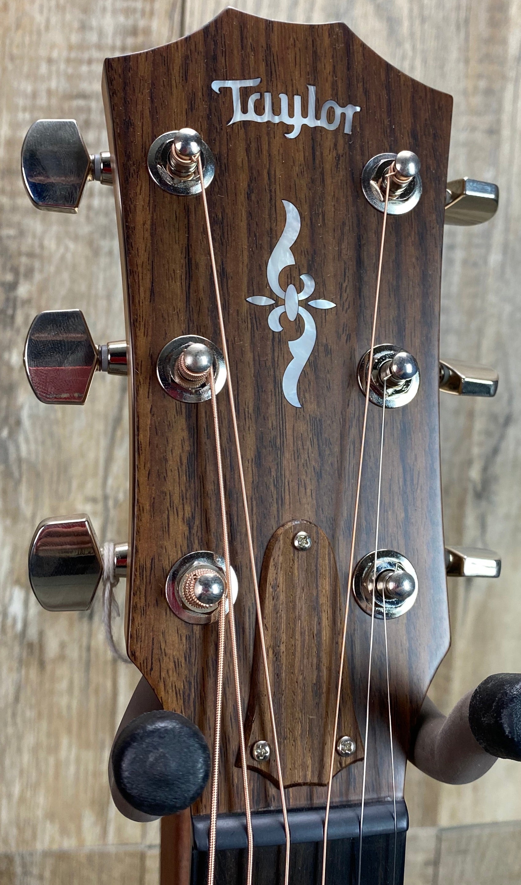 Close up angle of Taylor 412ce-R V-Class Bracing headstock.