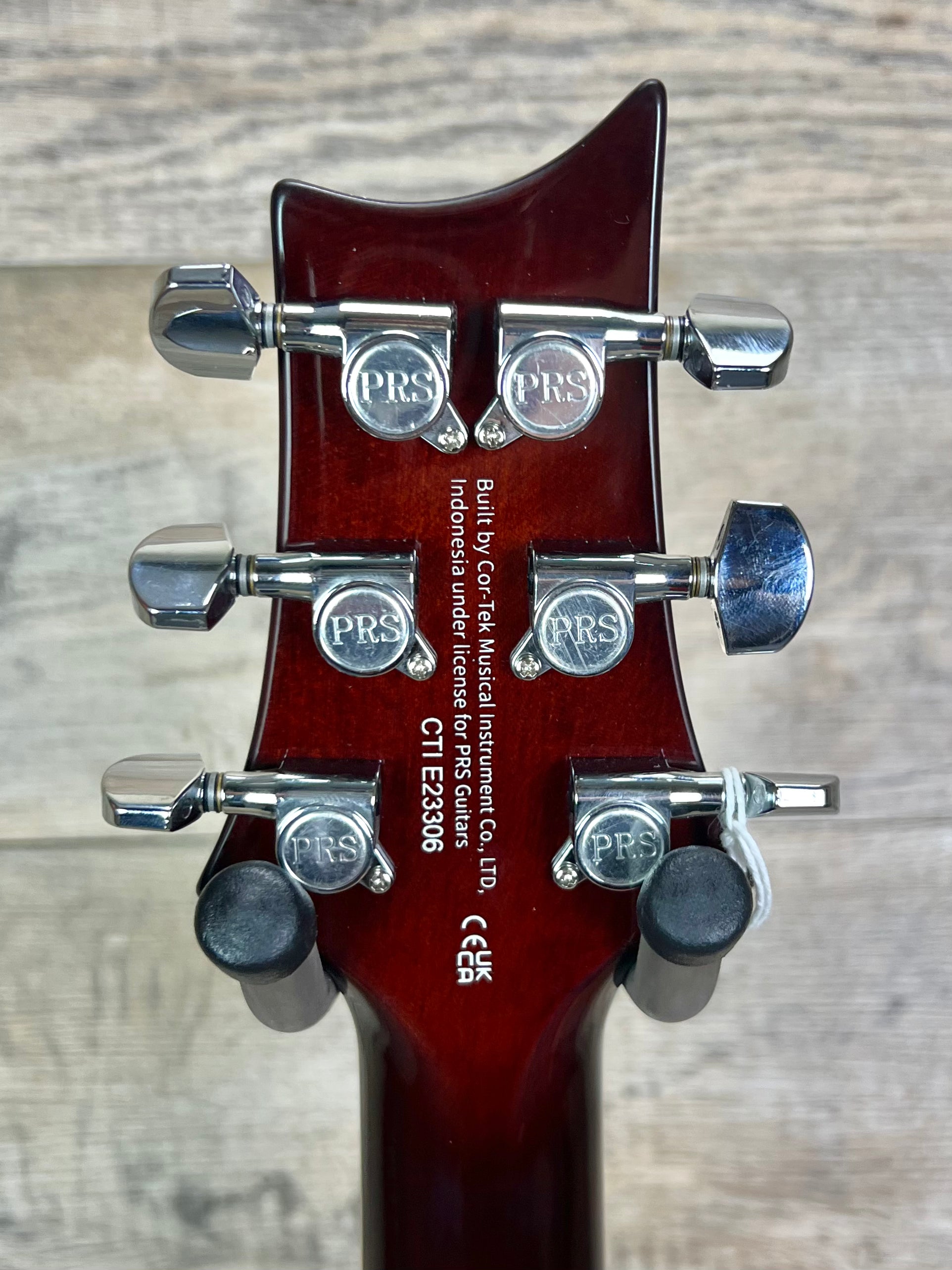 Back of headstock of PRS Paul Reed Smith SE Standard 24-08 Tobacco Sunburst.