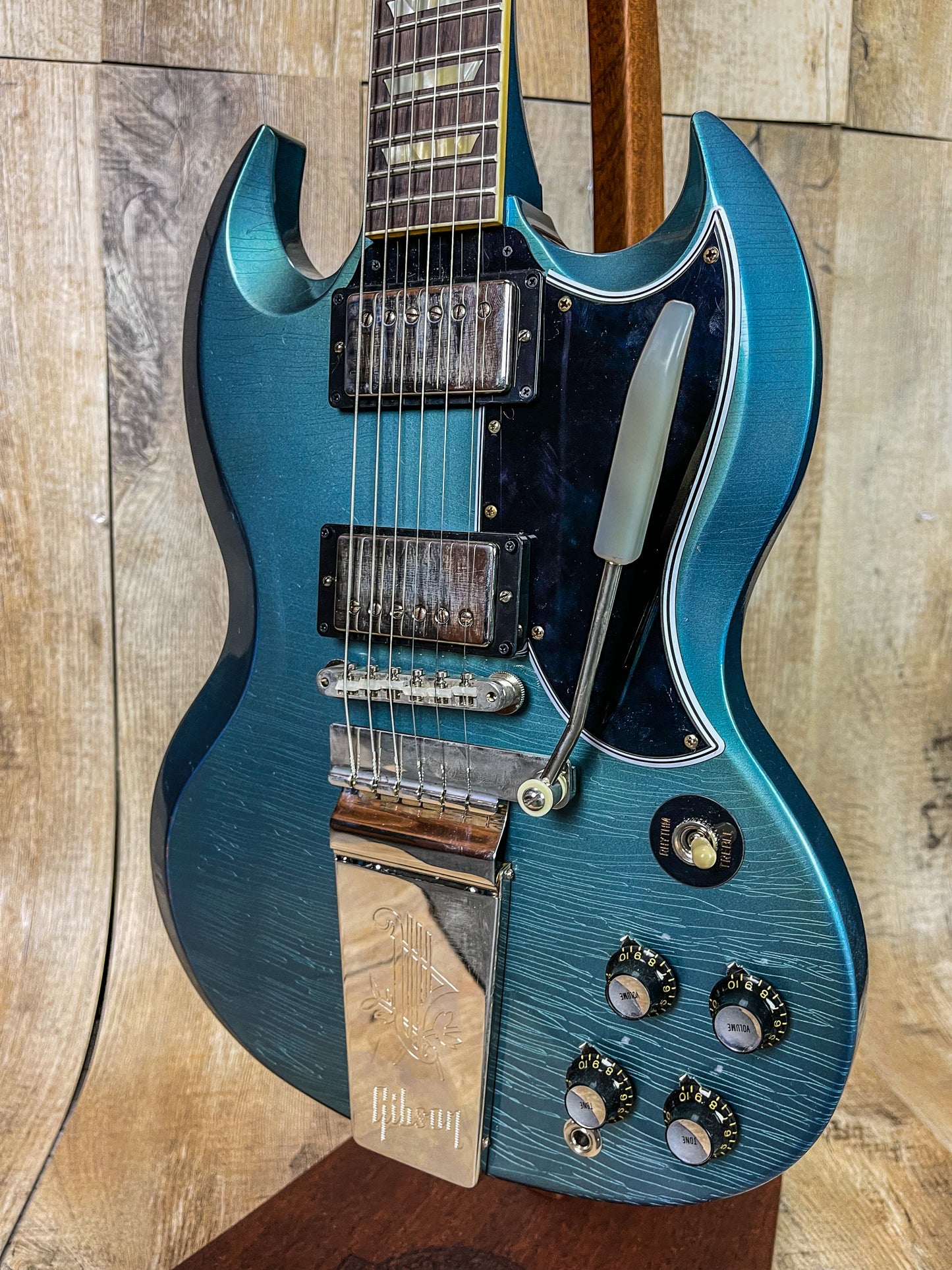 Front angle of Gibson Custom Shop Murphy Lab 1964 SG Standard Reissue Pelham Blue w/ Maestro Light Aged.