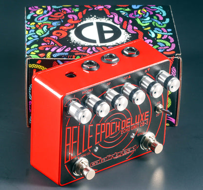Side angle of Catalinbread Belle Epoch Deluxe Tone Shop Exclusive Limited Edition Red with box in background.