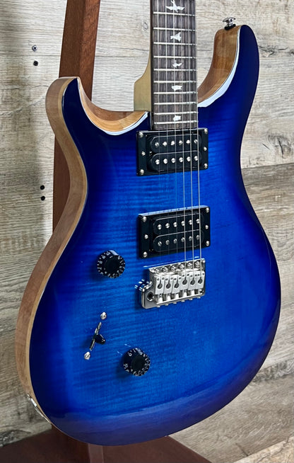 Front left angle of PRS Paul Reed Smith SE Custom 24 Left Hand Faded Blue Burst.