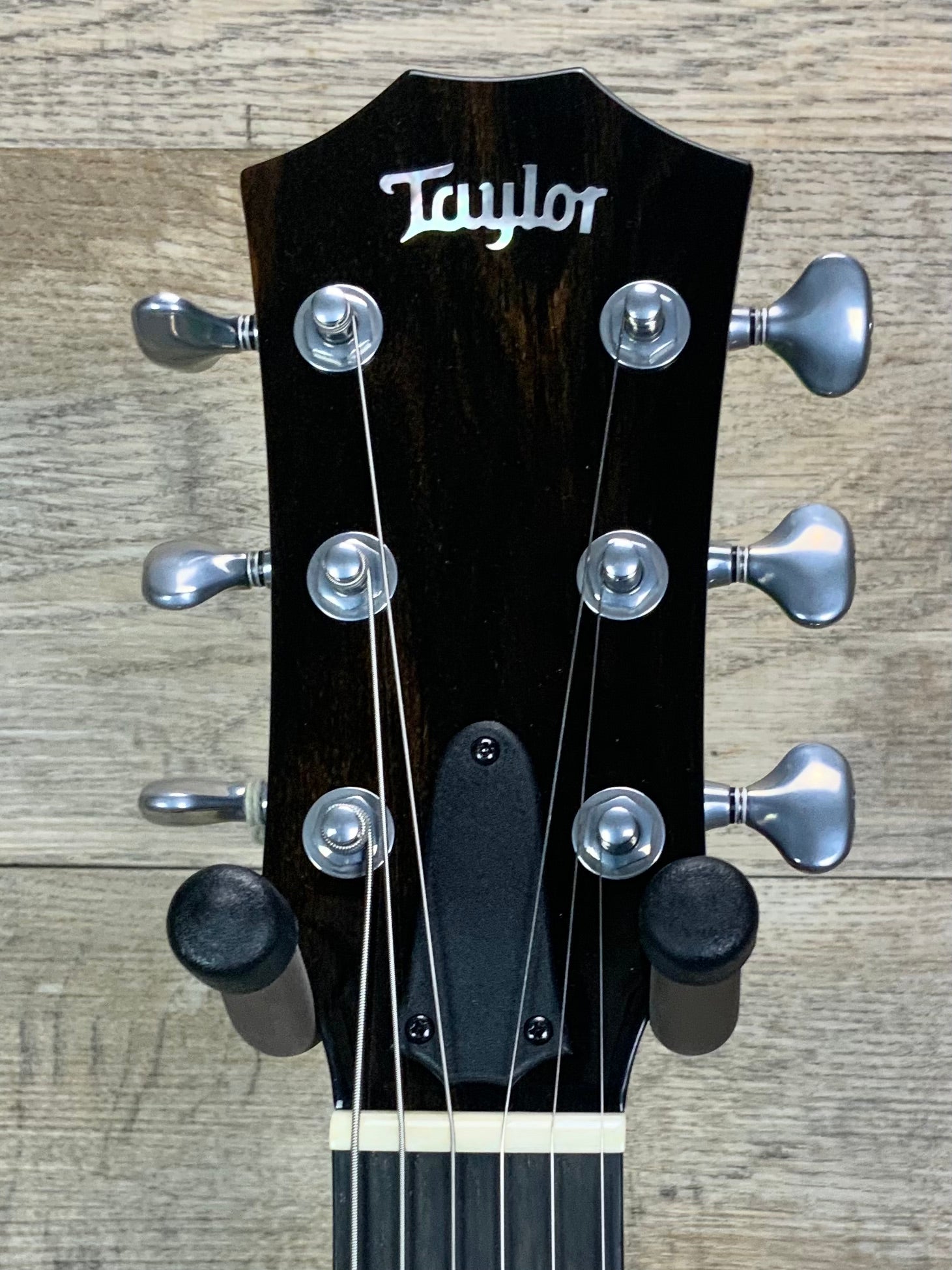 Closeup of Taylor Custom T5z LTD Quilt Maple Top Shark Grey Custom#11 headstock.
