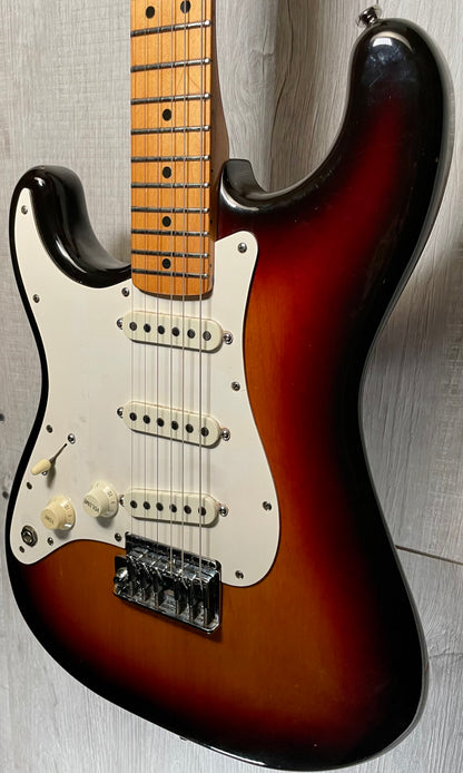 Front right angle of Used Vintage 1983 Fender Left Hand Stratocaster 3 Tone Sunburst TSS869.