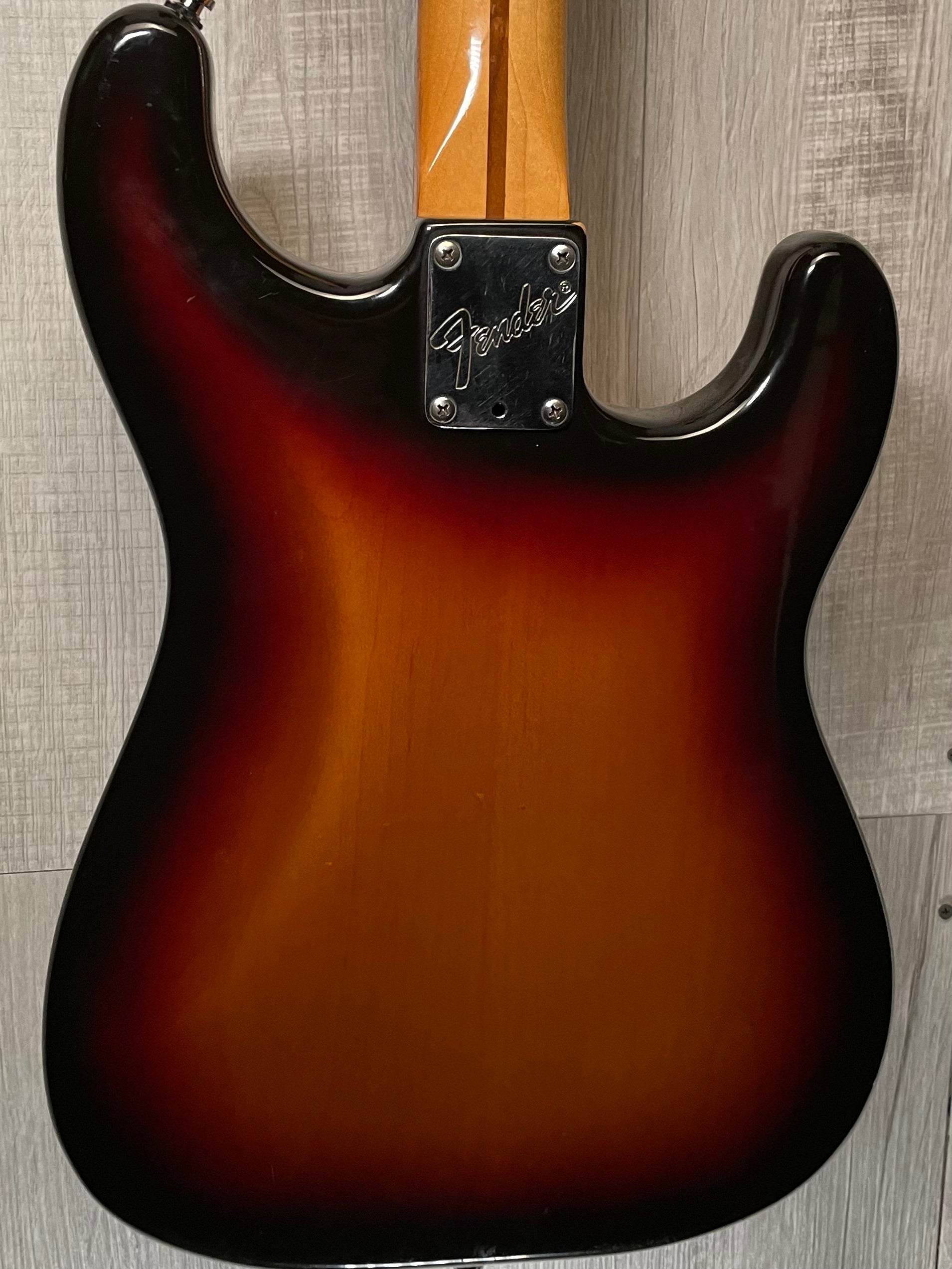 Back of Used Vintage 1983 Fender Left Hand Stratocaster 3 Tone Sunburst TSS869.