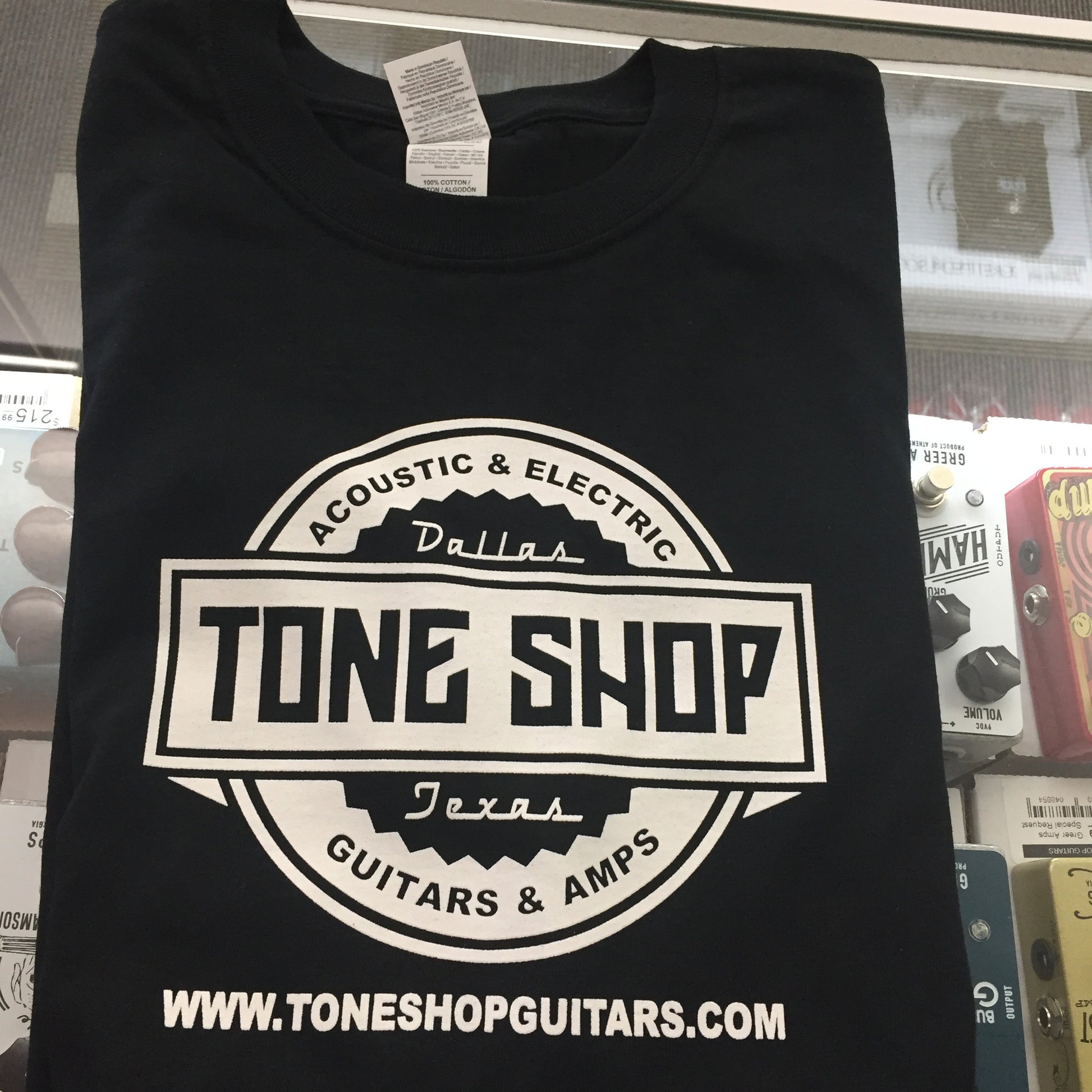 Top down photo of Tone Shop Guitars T-Shirt XL.