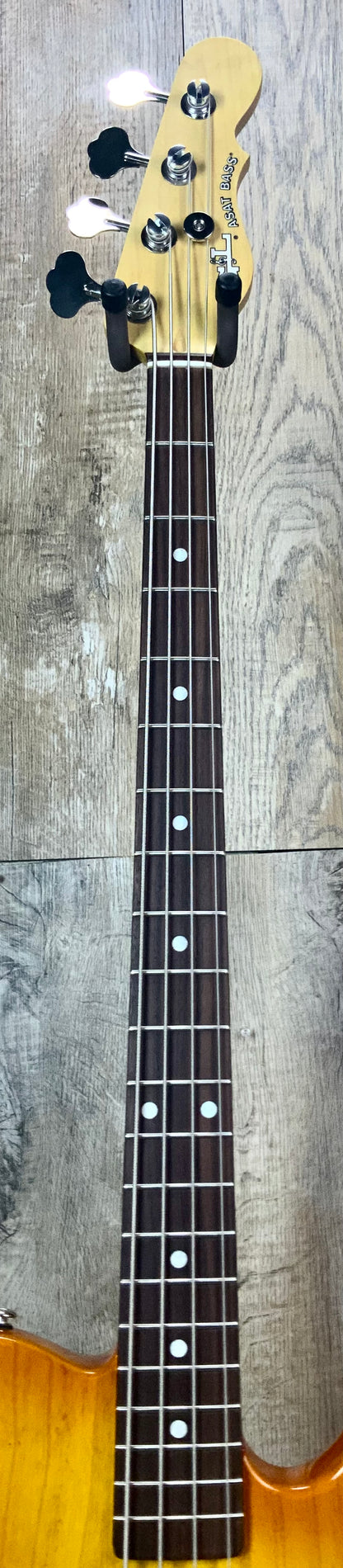 G&L USA ASAT Bass Honeyburst Ash RW fretboard and headstock.