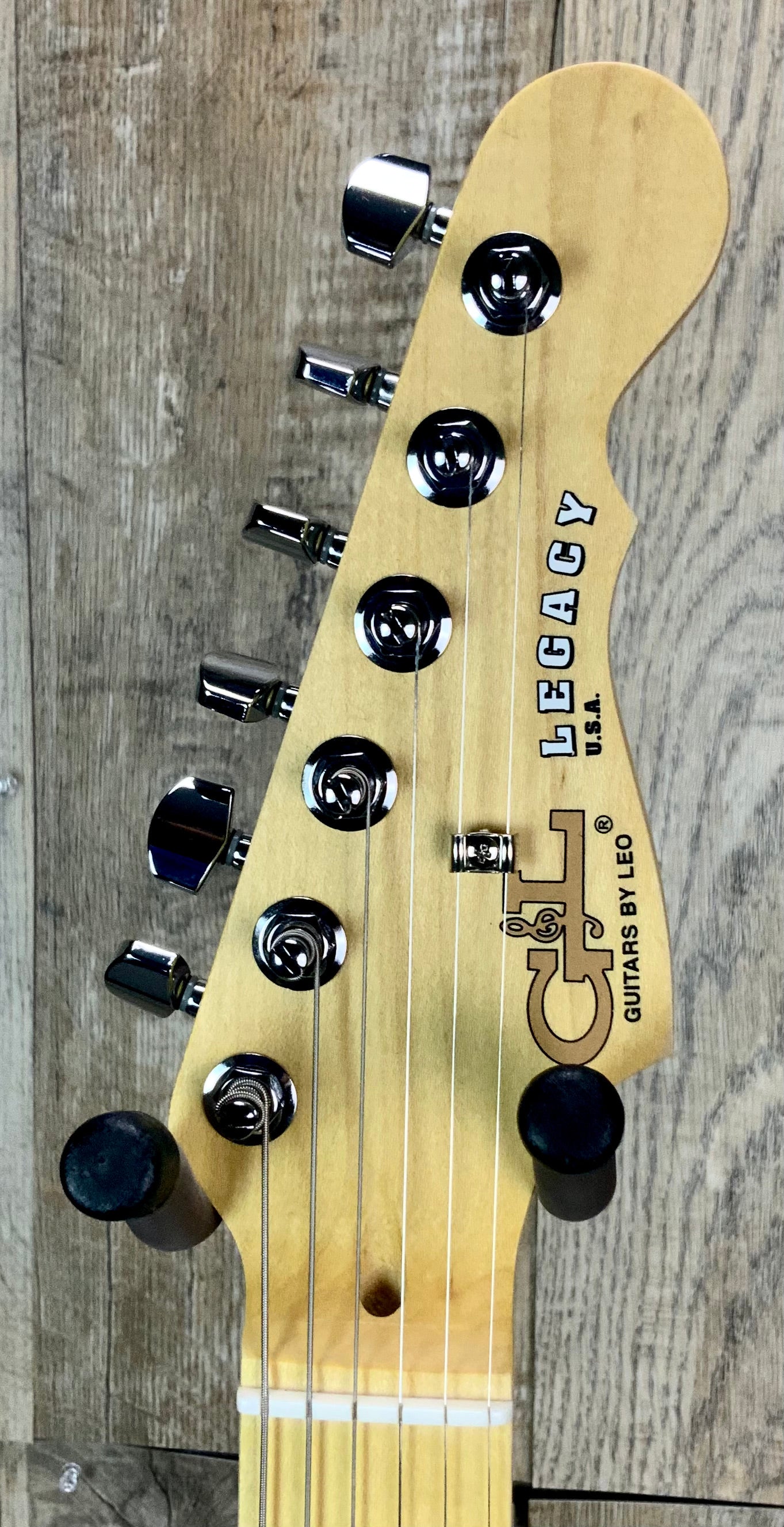 Close up of G&L USA Legacy HSS Andromeda MP headstock.