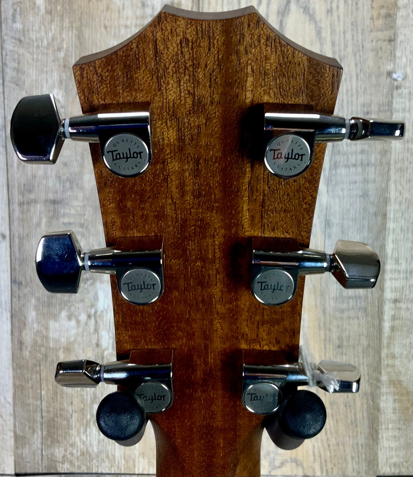 Back of Taylor AD17e American Dream Left Hand Natural headstock.