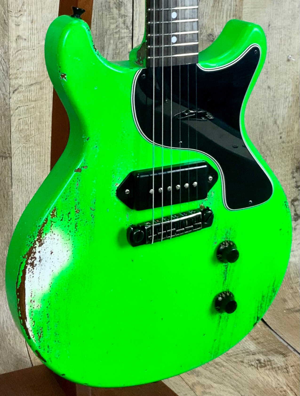 Front angle of Rock N Roll Relics Thunders DC Neon Green Med Relic.