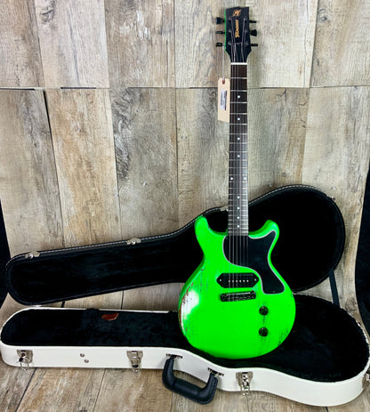 Front of Rock N Roll Relics Thunders DC Neon Green Med Relic W/case.
