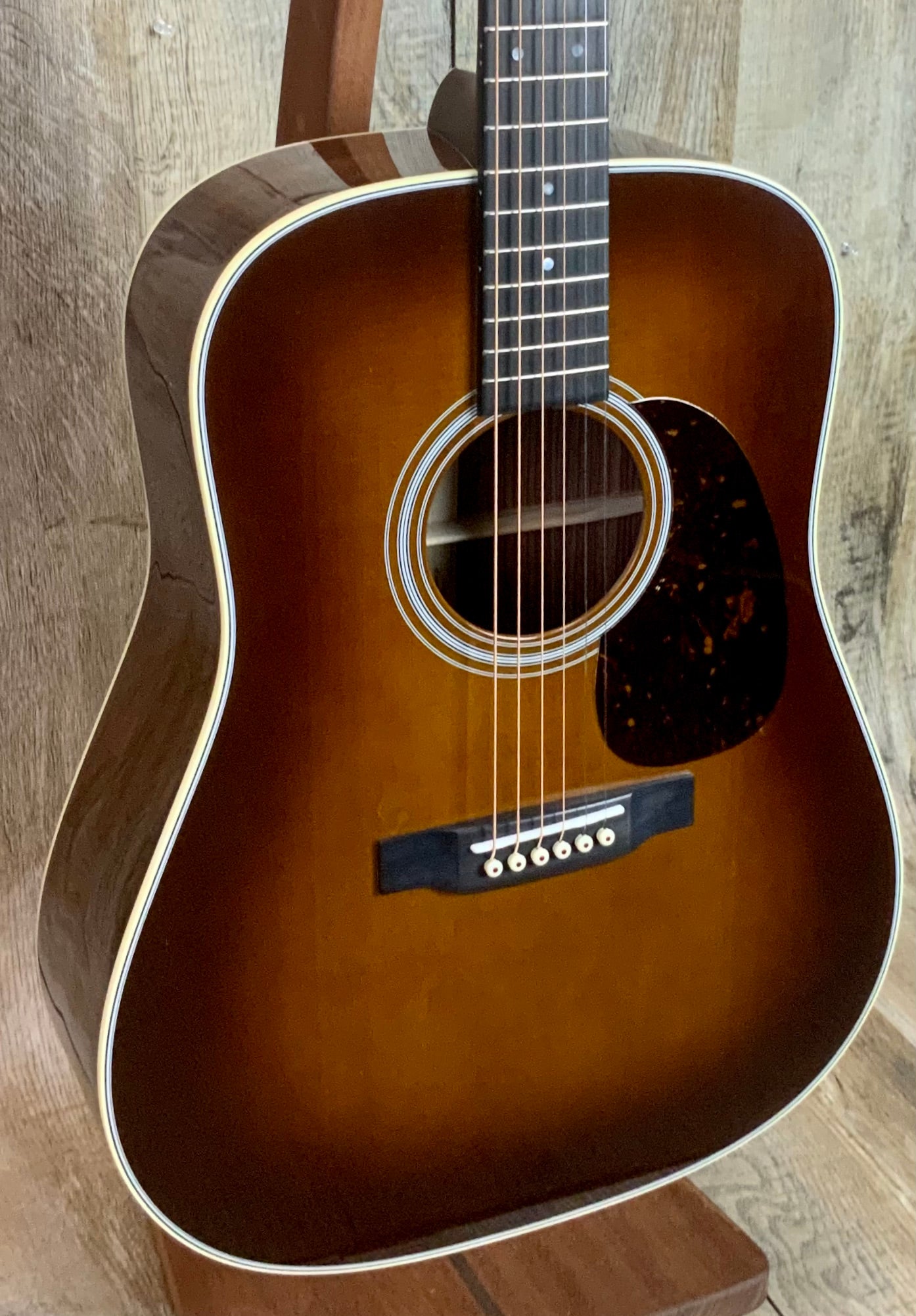 Front left angle of Martin D-28 Ambertone.