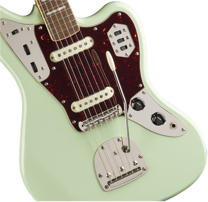 Front angle of Squier Classic Vibe ‘70s Jaguar Laurel Fingerboard Surf Green body.